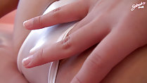 Finger slipping into her swimsuit