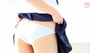Cute kogal Minami S strips uniform and plays with her panties