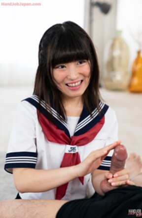 Kogal Suzumiya Aika in uniform on her knees giving handjob and milking cum