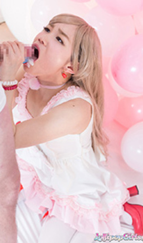 Kasugano Yui on her knees sucking lollipop and cock