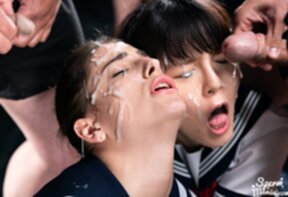 Mary and Scott Kristen kneeling in uniform taking bukkake facial cumshots