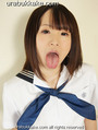 Extending her tongue wearing sailor suit uniform.jpg