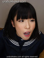 Leaning forward with mouth full of cum dripping down onto her seifuku uniform.jpg